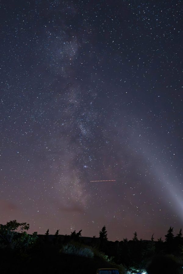 Beautiful night sky with Milky Way visible over rural Türkiye landscape.
